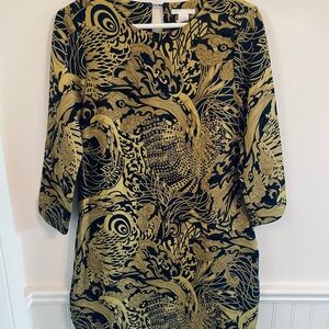 Elegant Black and Gold Patterned Mini Dress